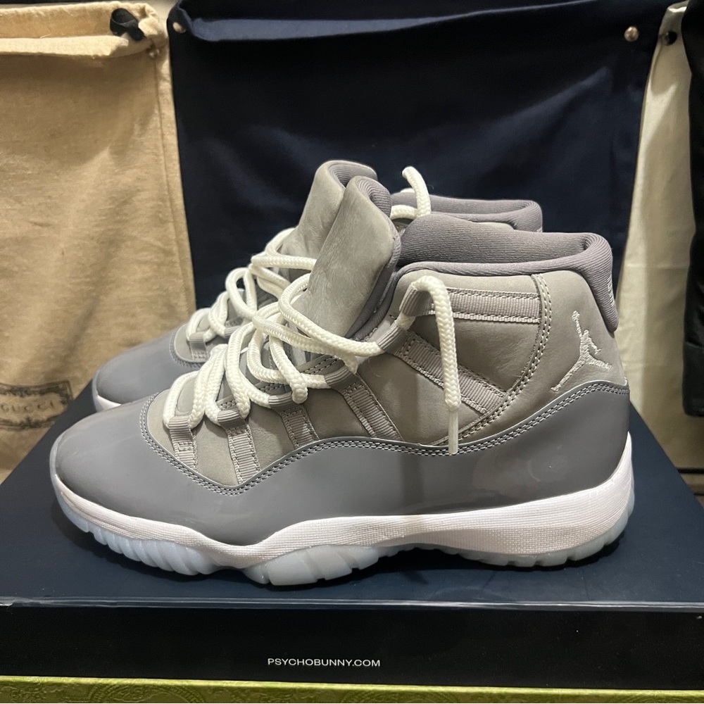 Gray and White Jordan 11 Sneakers